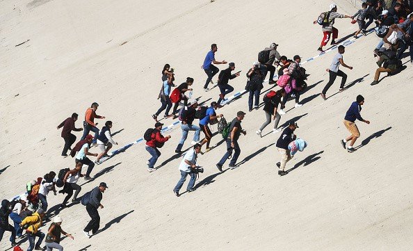 Chaos: Migrant Caravan Members Attempt to Storm U.S. Border