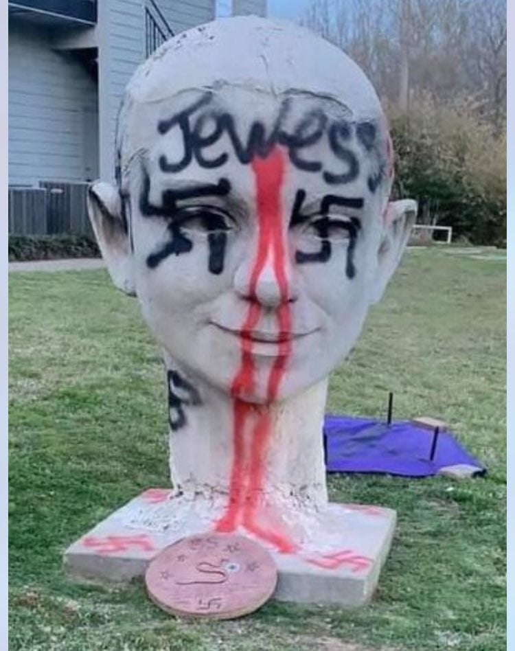 Woman arrested in racist and anti-Semitic graffiti that targeted Democrats in Oklahoma