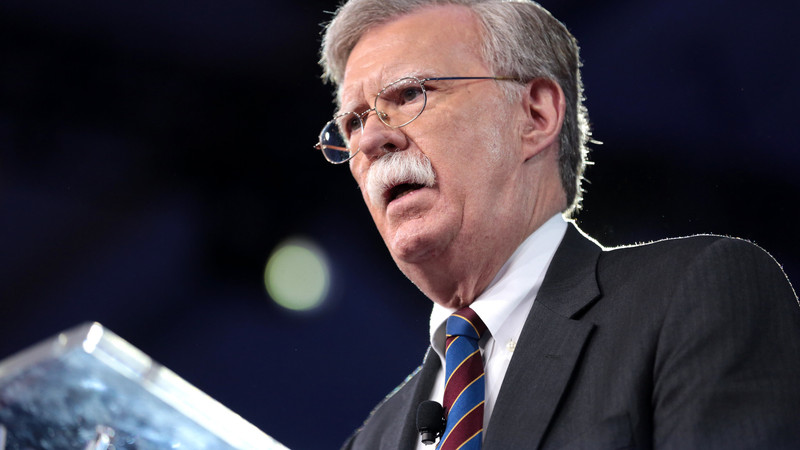 John Bolton lashes out at Trump's Ukraine policy days after FBI raided his home