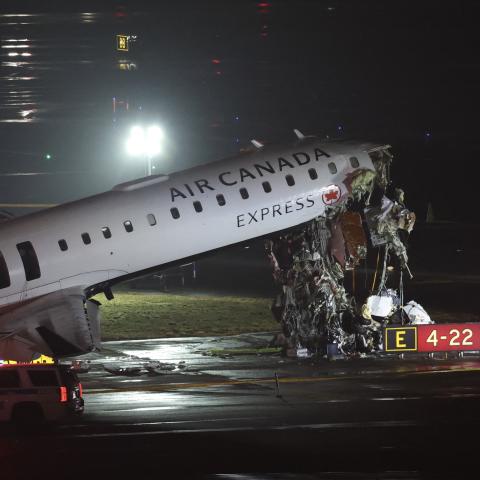 Air Canada Express jetliner crashes with firetruck at New York’s LaGuardia Airport, killing two