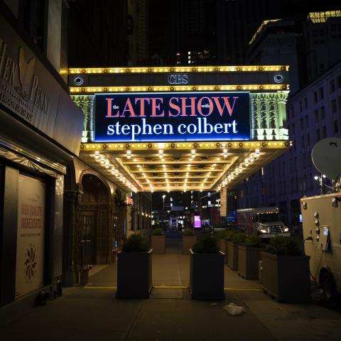 Trump posts AI video showing him throwing Colbert in a dumpster 