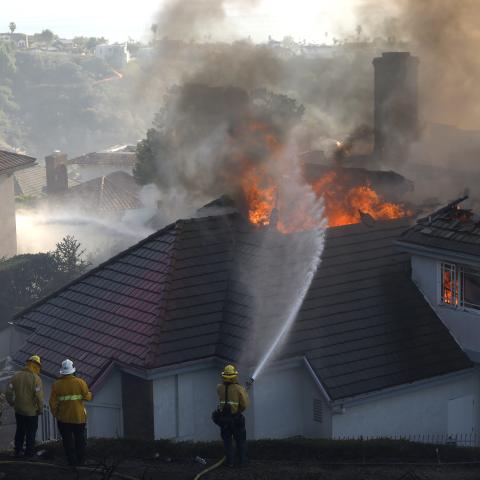Officials issue evacuation orders for areas of Orange County due to wildfire spreading 