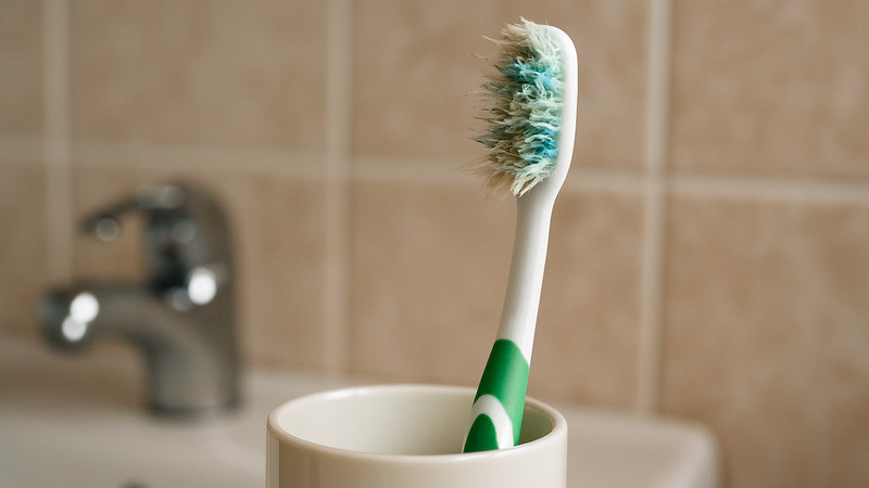 Your toothbrush is bristling with bacteria - is it time to change it?