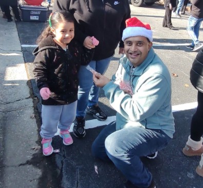 VFAF’s Kartik Bhatt delivered Christmas gifts to the needy with the Cobb County Georgia Sheriff’s Department Community Engagement Operation