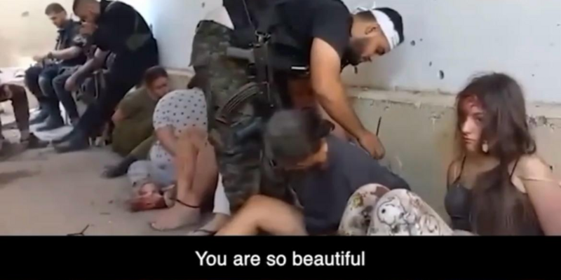 HORRIFIC: Hamas militants line up and taunt bloodied female Israeli soldiers on Oct 7: 'Here are the girls who can get pregnant'