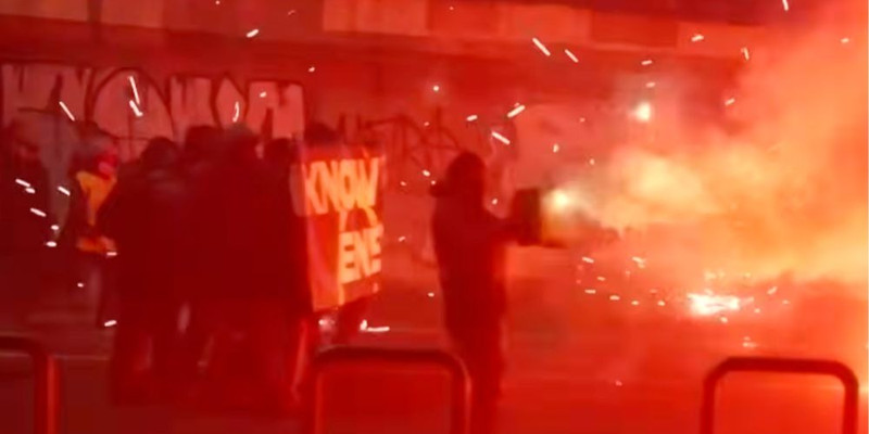 Rioters set off fireworks, throw smoke bombs at police in Milan during anti-Olympics unrest 