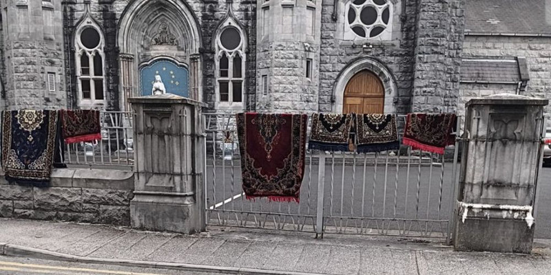 Backlash after local Muslims hang prayer mats on Catholic church railings in Ireland
