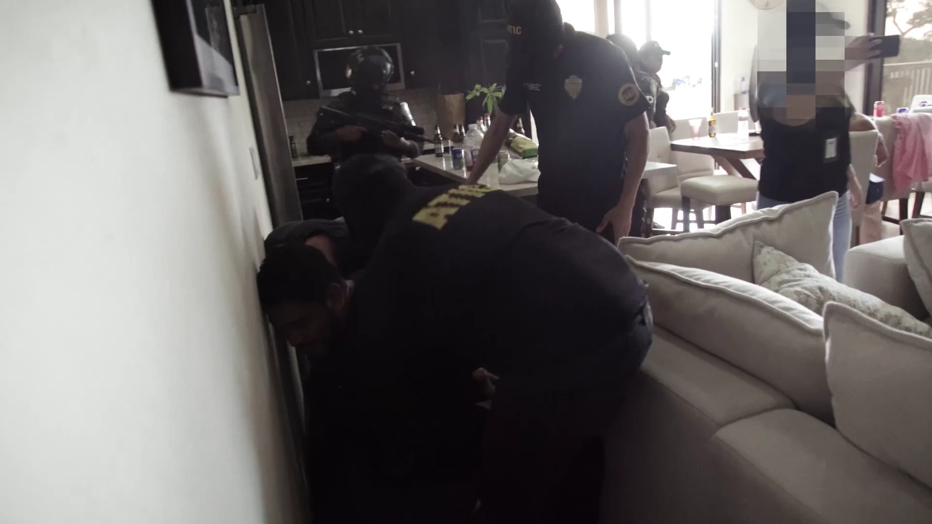 Suspect takedown during anti-trafficking operation
