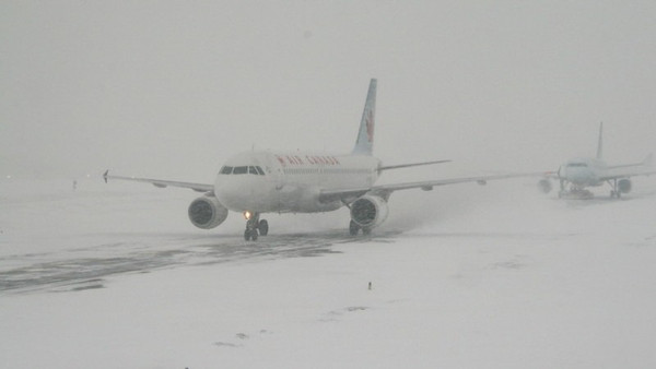 More than 10,500 flights canceled Sunday as massive winter storm sweeps across U.S.