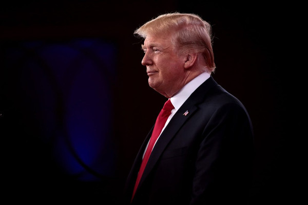 Trump Shuts Down Booing Crowd, Defends Thune at Rowdy Dallas Convention