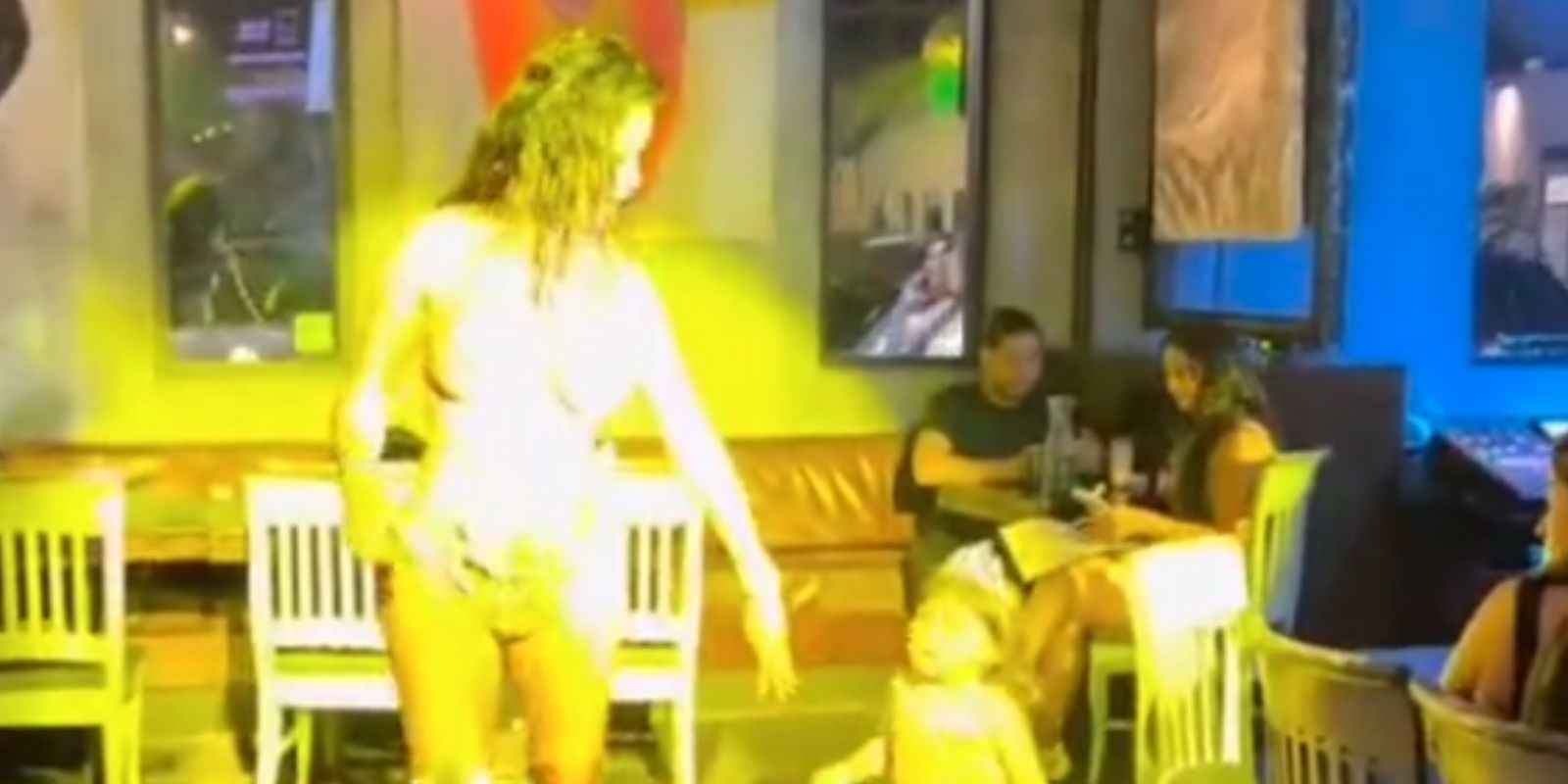 Nearly naked drag queen pulls child along at 'Drag Brunch'