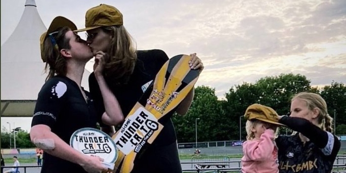 Biological males win women's cycling event, kiss while third place female cares for child