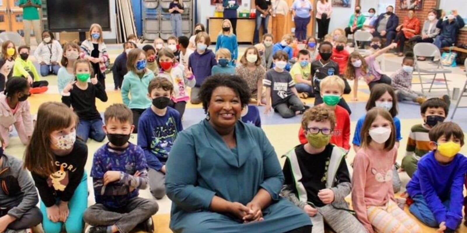 Stacey Abrams roasted for posing maskless in photo-op with masked children