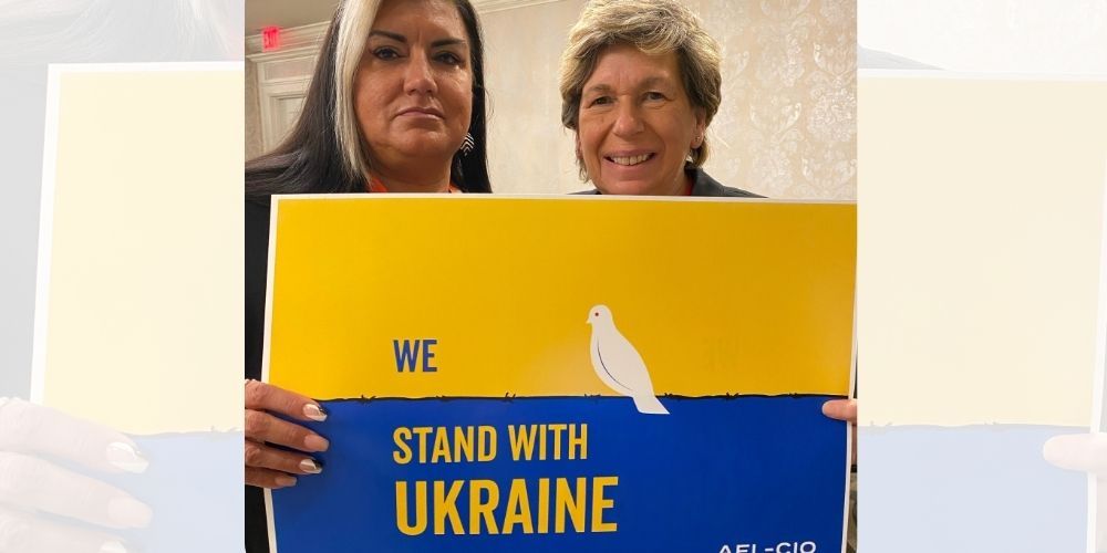 America's teachers union leaders pose with upside-down Ukraine flag in epic virtue-signal fail