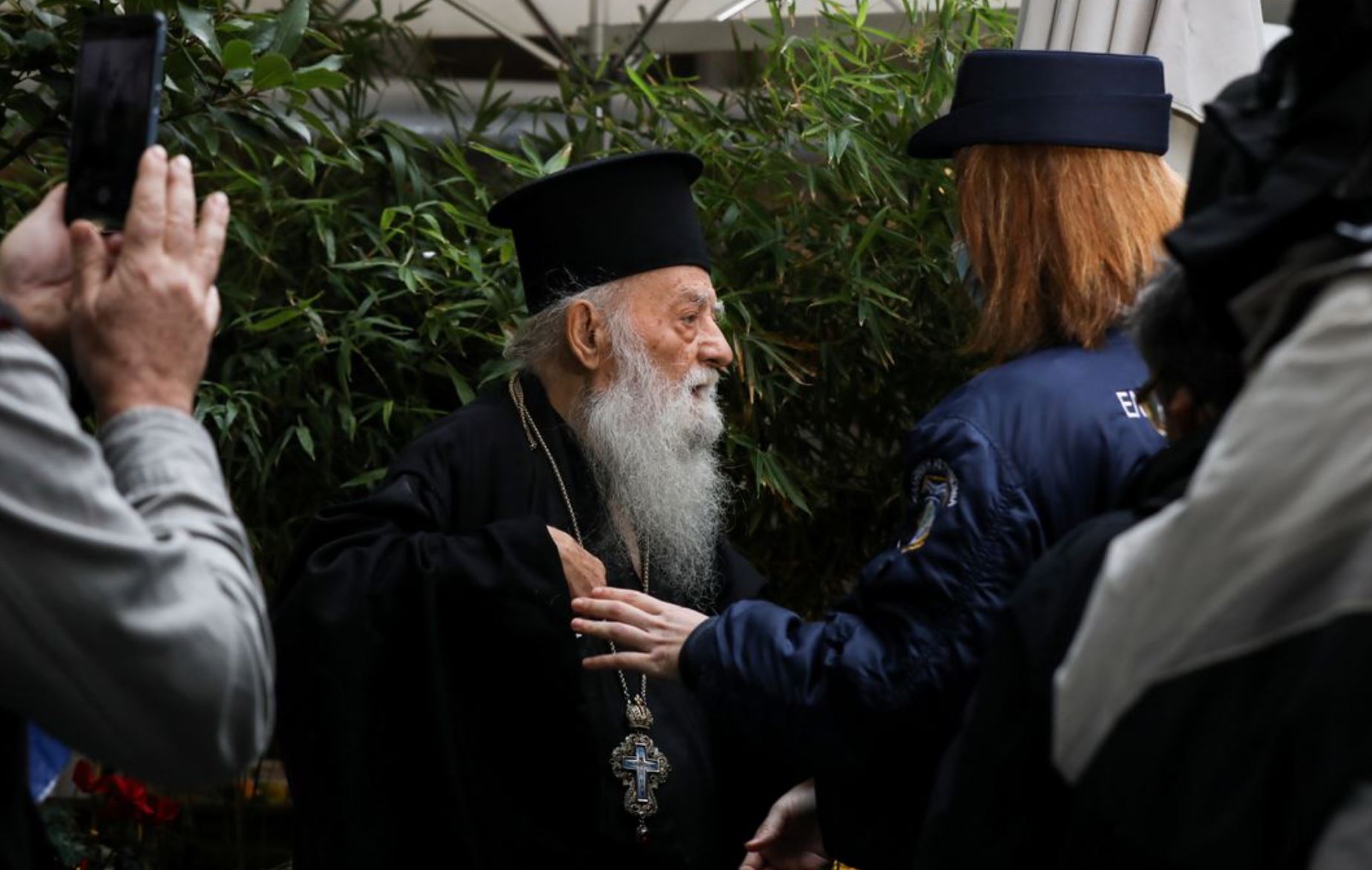 Greek Orthodox priest shouts