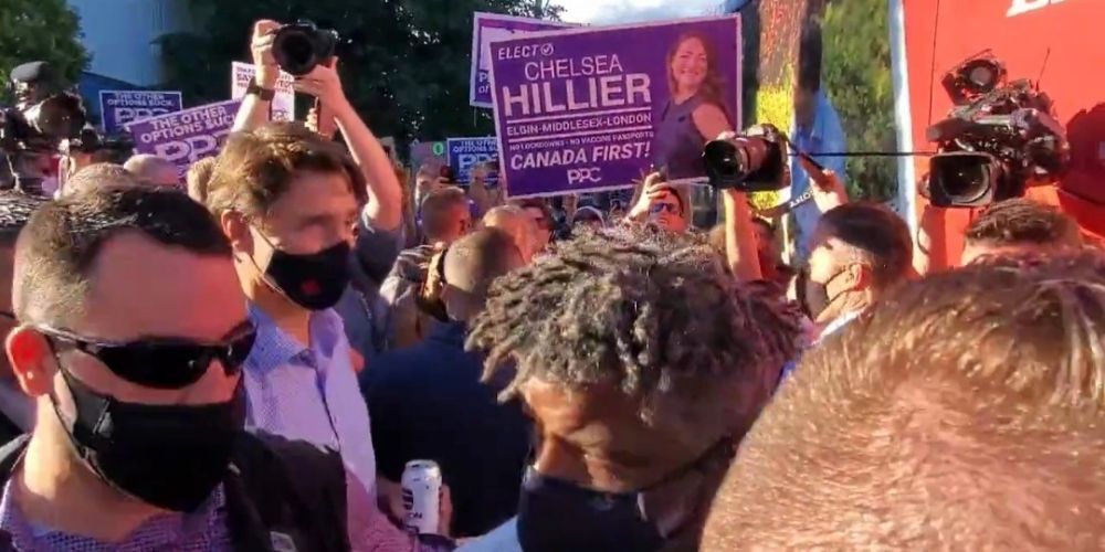 Trudeau swarmed again in Ontario, protestors throw gravel and debris at prime minister