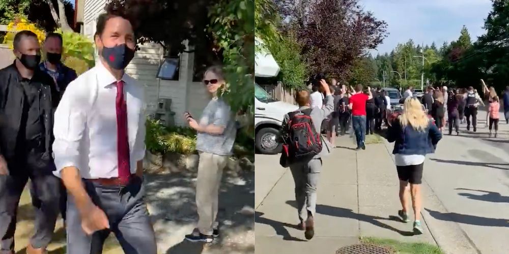 BREAKING: Trudeau booed, chased by protestors during campaign stop in BC
