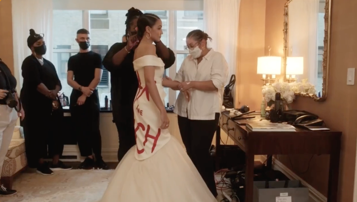 WATCH: New footage shows AOC being waited on by masked 'servant class' before Met Gala