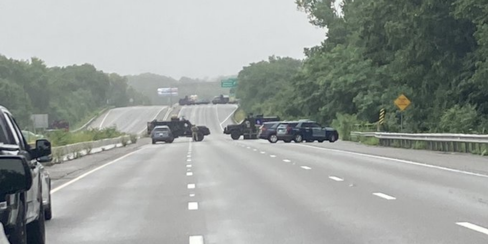 Massachusetts police arrest 11 men after standoff with armed group that 'does not recognize our laws'