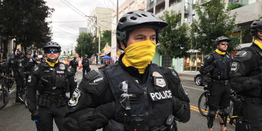 Seattle City Council debates new ways to lay off more police officers including by race