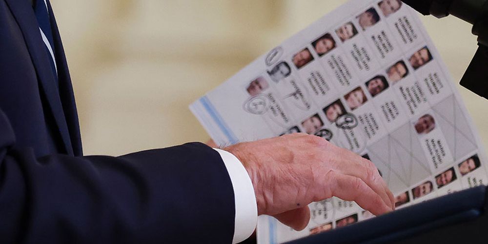 President Biden spotted with apparent cheat sheet at first solo press conference