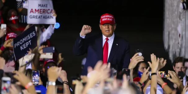 WATCH: Trump hints at firing Dr. Fauci after election, crowd goes wild