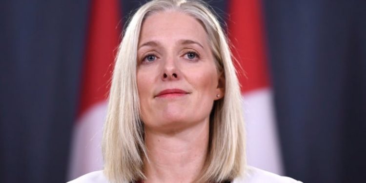 Catherine McKenna says “Do right by the planet” and get the carbon tax rebate before a heat-wave kills you