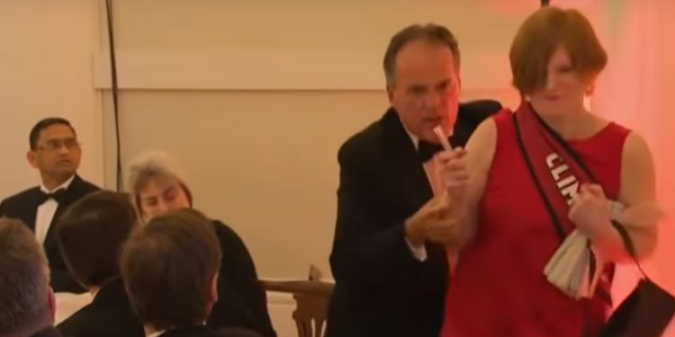 British Foreign Minister suspended after grabbing Greenpeace protestor