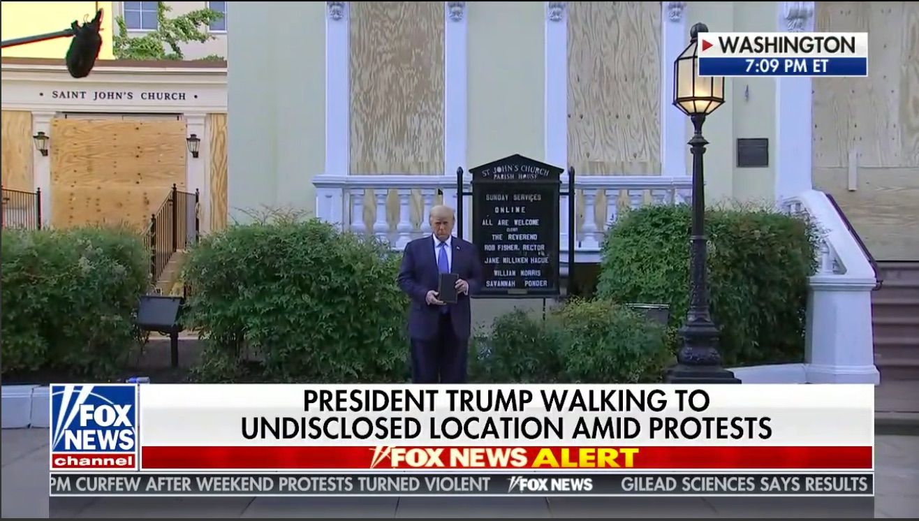 Trump visits church that was site of arson, carries bible