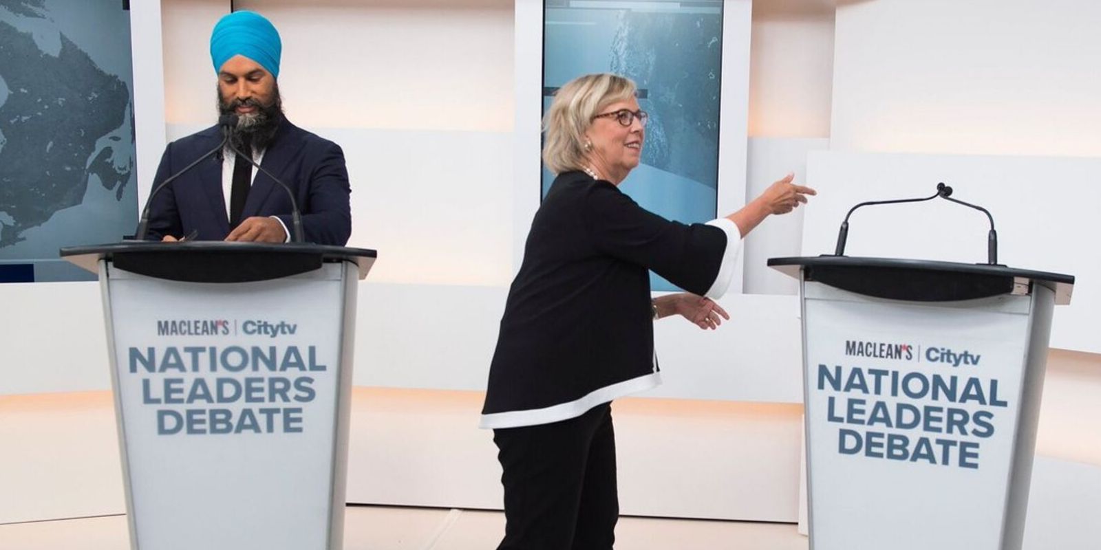 First election debate fires off with empty podium standing in for Trudeau