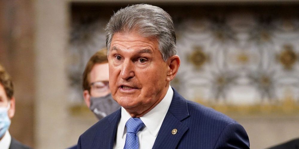 Democrat Sen. Manchin deflects questions asking if he will support President Biden in 2024