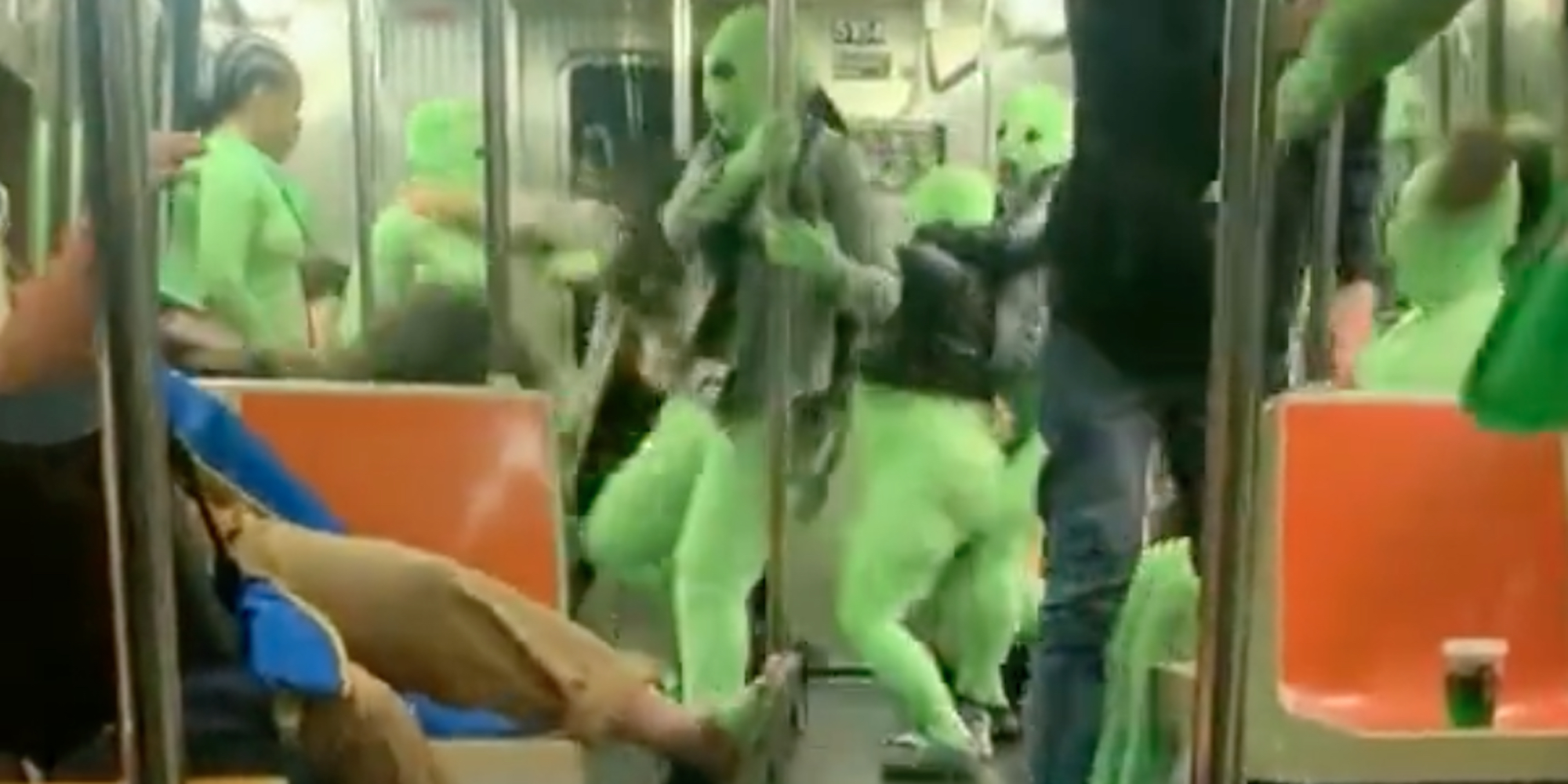 Gang of women in neon green bodysuits attack passengers on NYC subway