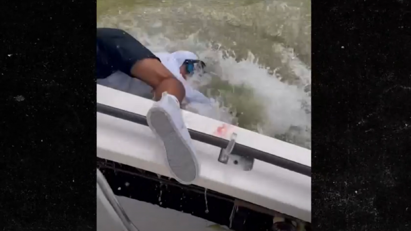 [VIDEO] Like a Scene Out of “Jaws” Movie -  Man Dragged Off Boat By Shark in Florida